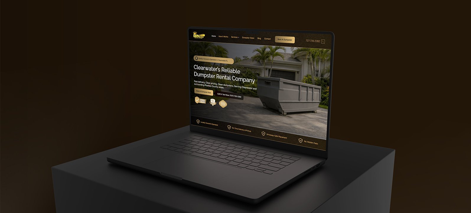 Laptop mockup showing the Bin King dumpster rental website homepage with dark gold branding and call-to-action buttons